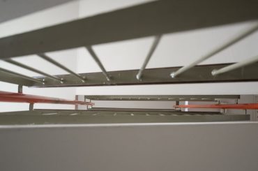 Does sound travel up or down in an apartment.