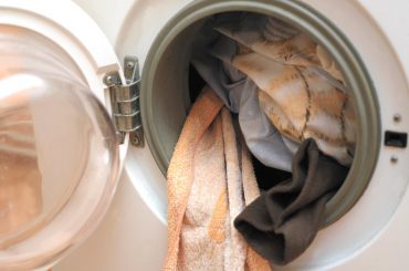 Can you wash sheets and towels with clothes?