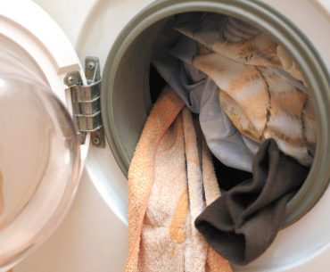Can you wash sheets and towels with clothes?