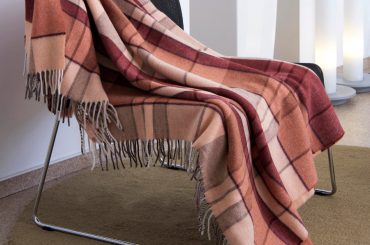 Throw blanket on a chair.