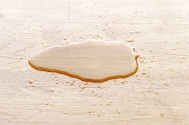 Water causing damage to laminate floors.