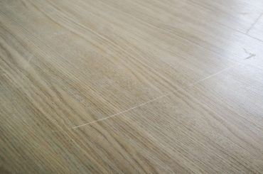 How to fix scratches in laminate flooring.