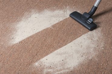 Should you vacuum or dust first?