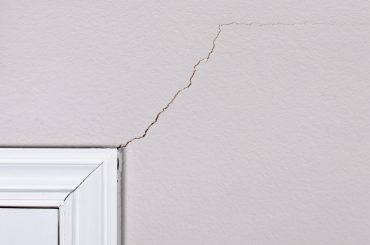 Wall cracks as a result of structural issues.