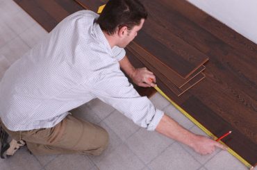 How to install laminate floor over tile.