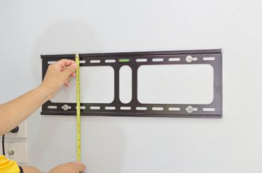 Proper height for a wall-mounted TV in the bedroom.