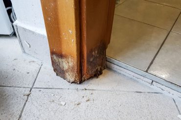 The cost of fixing a rotted door frame.