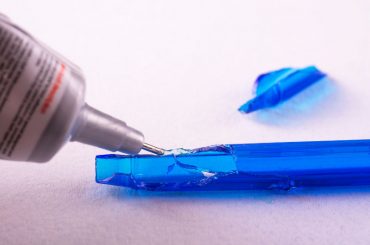 Bonding plastic with super glue.