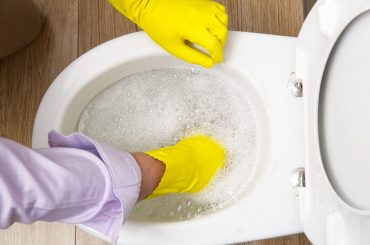 Toilet water rising too high. Unclogging the drain.