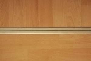Transitioning Wood Flooring Between Rooms: Tips & Transition Strips ...