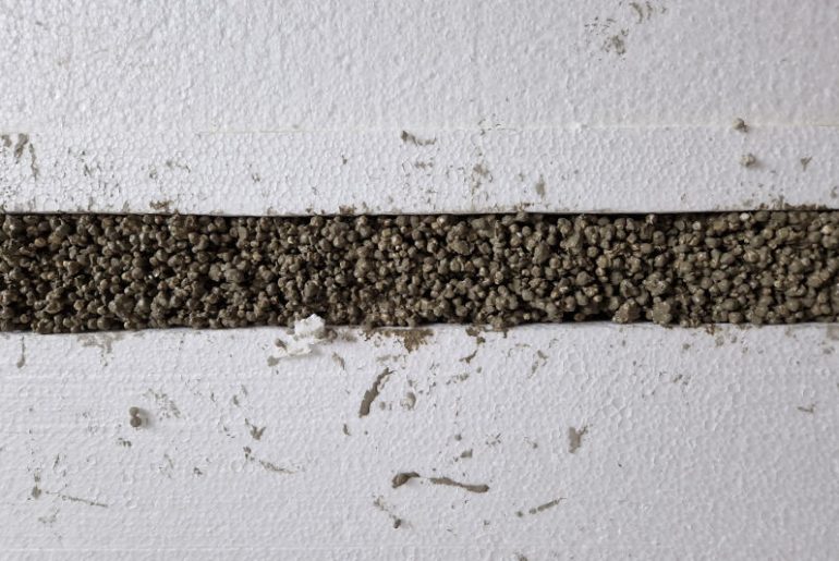 EPS concrete made from EPS beads, cement and water for covering pipes and cables.