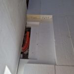 EPS 100 rigid insulation boards installed on a prepared floor base, providing thermal insulation and load support beneath the concrete slab.